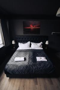 Postel nebo postele na pokoji v ubytování Brim Hotel