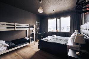 Postel nebo postele na pokoji v ubytování Brim Hotel