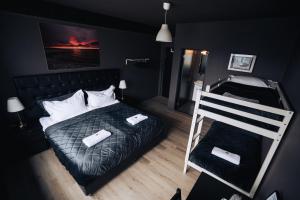Postel nebo postele na pokoji v ubytování Brim Hotel