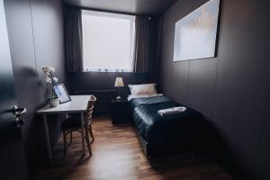 Postel nebo postele na pokoji v ubytování Brim Hotel