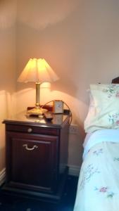 Voodi või voodid majutusasutuse Corrib View Guesthouse h91rr72 toas