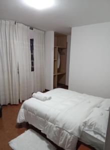 Ein Bett oder Betten in einem Zimmer der Unterkunft Hotel Aquarius