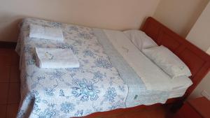Ein Bett oder Betten in einem Zimmer der Unterkunft Hotel Aquarius