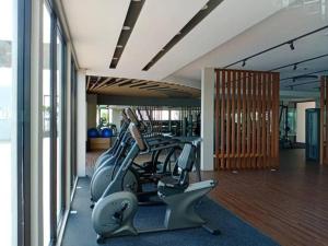 a gym with two treadmills and a treadmill at HMM Lili - Nilai in Nilai