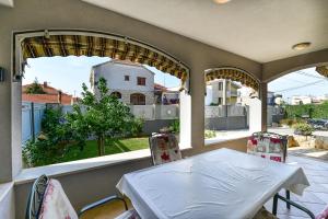 Balkón nebo terasa v ubytování Family friendly apartments with a swimming pool Zadar - 16336
