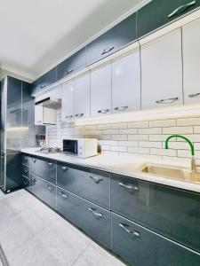 Kuchyň nebo kuchyňský kout v ubytování - Enjoy Your Privacy - Complimentary Airport Pick Up - + 7 fotografií