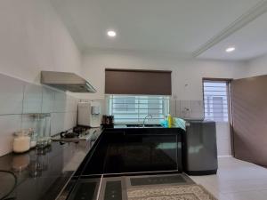 Kuchyň nebo kuchyňský kout v ubytování Iseymia Homestay + 9 fotografií