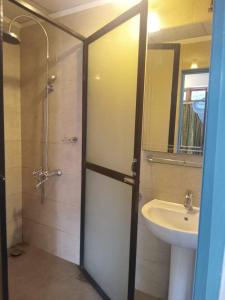 Koupelna v ubytování Hotel Shalini