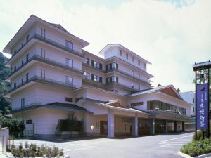 a large white building with a lot of windows at Nikko Senhime Monogatari in Nikko