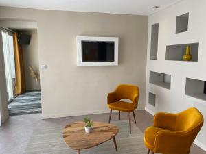 Телевизор и/или развлекательный центр в Hotel Europe