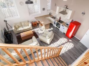 an overhead view of a living room and kitchen at Asquith Penthouse in Huddersfield