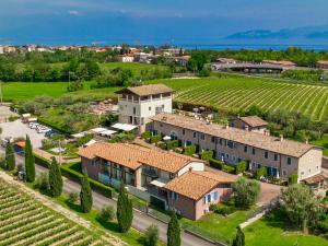 an aerial view of a estate with a vineyard at Bertoletta Village Apartments in Peschiera del Garda