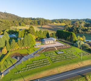 an aerial view of a garden in front of a house at Adelaide Hills luxury cottage spectacular views in Summertown
