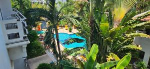 an overhead view of a swimming pool in a resort at Oasis Rentals, Diana Estate, Pattaya in Pattaya Central