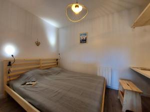 Posteľ alebo postele v izbe v ubytovaní Villard je t'aime - Résidence Les Tennis - 2 Appartements 2 pièces 5 p et 6 p