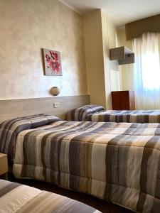 Postel nebo postele na pokoji v ubytování Hotel Vallisdea