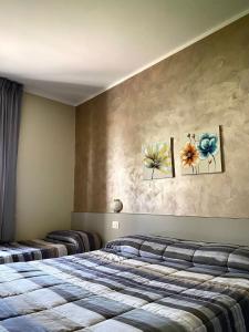 Postel nebo postele na pokoji v ubytování Hotel Vallisdea