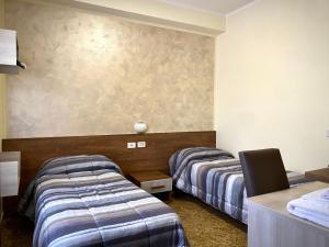 Postel nebo postele na pokoji v ubytování Hotel Vallisdea