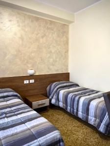Postel nebo postele na pokoji v ubytování Hotel Vallisdea