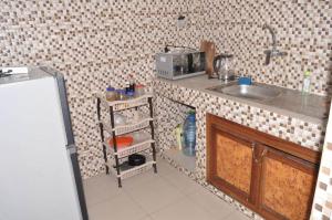 a kitchen with a sink and a counter top at Dakar Top destination 2 in Dakar
