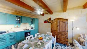 Kuchyň nebo kuchyňský kout v ubytování Qala Bed&Breakfast with swimming pool - IL-Wenniessa