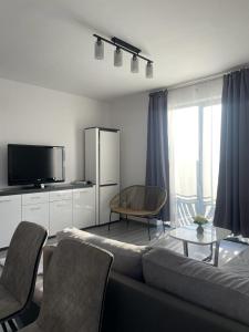 Televisyen dan/atau pusat hiburan di Apartament Daria Baile Felix