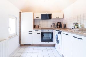 Η κουζίνα ή μικρή κουζίνα στο Altstadtliebe +16 φωτογραφίες