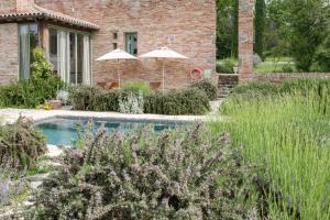 Bazén v ubytovaní Borgo 69 Villas & Suites alebo v jeho blízkosti