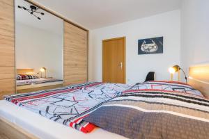 Postel nebo postele na pokoji v ubytování Apartments Sara