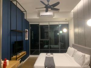 Postel nebo postele na pokoji v ubytování Ceylonz Suites by ROOMY