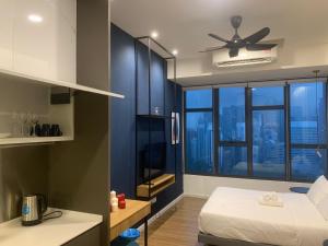 Postel nebo postele na pokoji v ubytování Ceylonz Suites by ROOMY