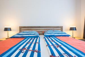 Postel nebo postele na pokoji v ubytování Apartments Sara