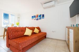 TV a/nebo společenská místnost v ubytování Apartments Sara