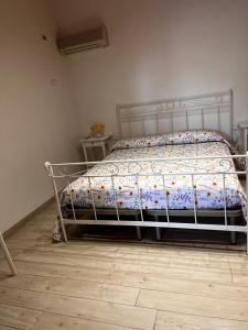A bed or beds in a room at B&B Colle Acquabella
