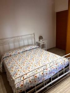 A bed or beds in a room at B&B Colle Acquabella