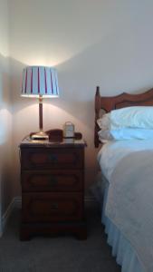 Voodi või voodid majutusasutuse Corrib View Guesthouse h91rr72 toas