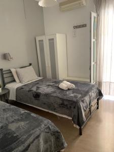 Postel nebo postele na pokoji v ubytování Guesthouse Corali