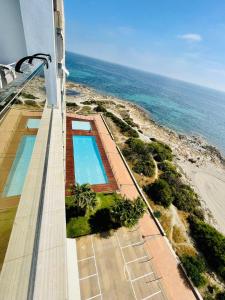 an aerial view of the ocean from a building at Apartamento El Osito in La Manga del Mar Menor