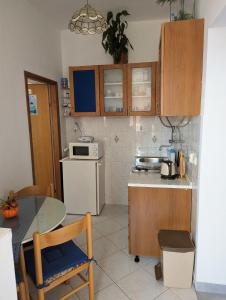 Kuchyň nebo kuchyňský kout v ubytování Apartman Nada