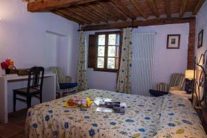 Postel nebo postele na pokoji v ubytování Piaggetta B&B