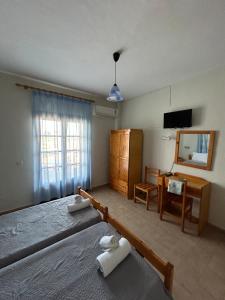 Fotografia z galérie ubytovania Christopher Apartments v destinácii Afitos