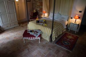 Postel nebo postele na pokoji v ubytování Piaggetta B&B