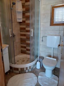 Kúpeľňa v ubytovaní Apartmani MATKO + 16 fotografií