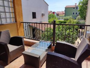 Balkón nebo terasa v ubytování Slim apartman i sobe