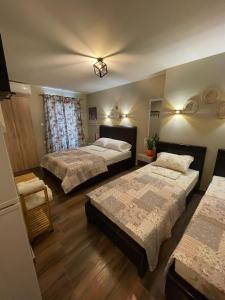Postel nebo postele na pokoji v ubytování Villa Rafailia