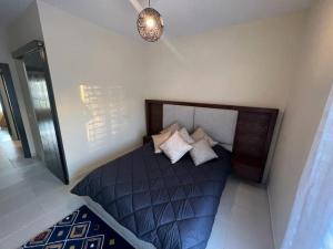 Ένα ή περισσότερα κρεβάτια σε δωμάτιο στο Superbe Appartement Bord de mer