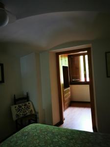 Postel nebo postele na pokoji v ubytování La Quiete nel verde