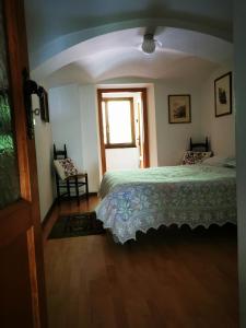 Postel nebo postele na pokoji v ubytování La Quiete nel verde