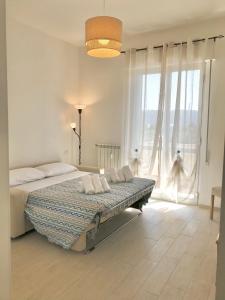 Posteľ alebo postele v izbe v ubytovaní Casa del Sole