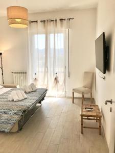 Posteľ alebo postele v izbe v ubytovaní Casa del Sole